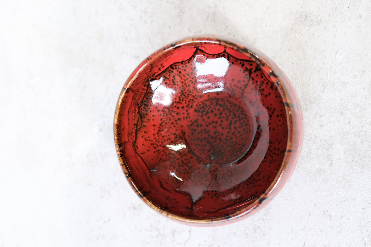 Japanese ceramic bowl with red lava glaze