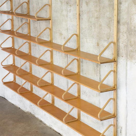 One of one custom Alvar Aalto Artek wall shelf in birch with adjustable shelves and bentwood brackets