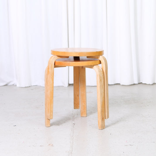 1950s Artek finger joint stool in birch with round seat and bentwood legs, vintage Finnish design furniture.