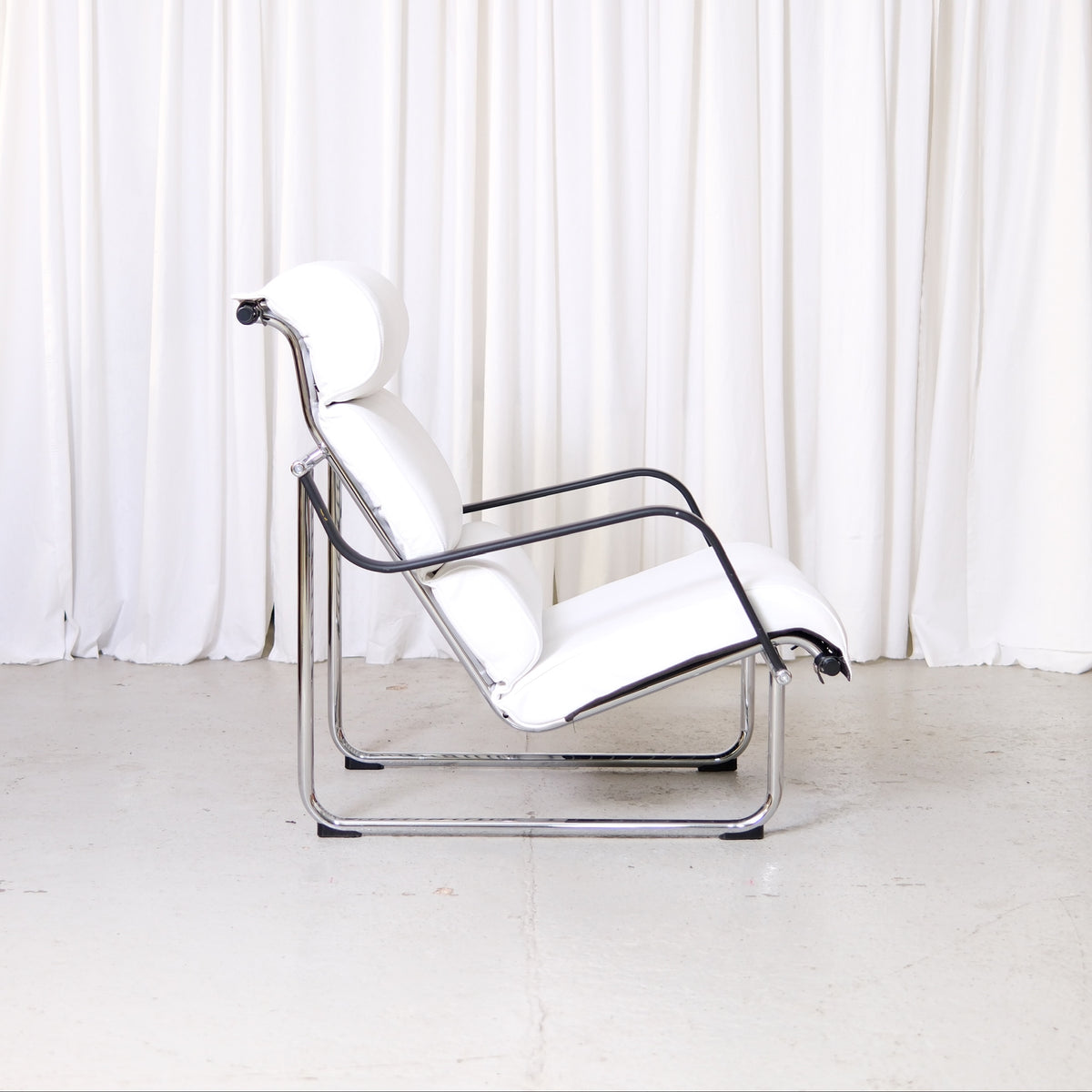 Yrjö Kukkapuro Remmi Lounge Chair and Ottoman in White Leather