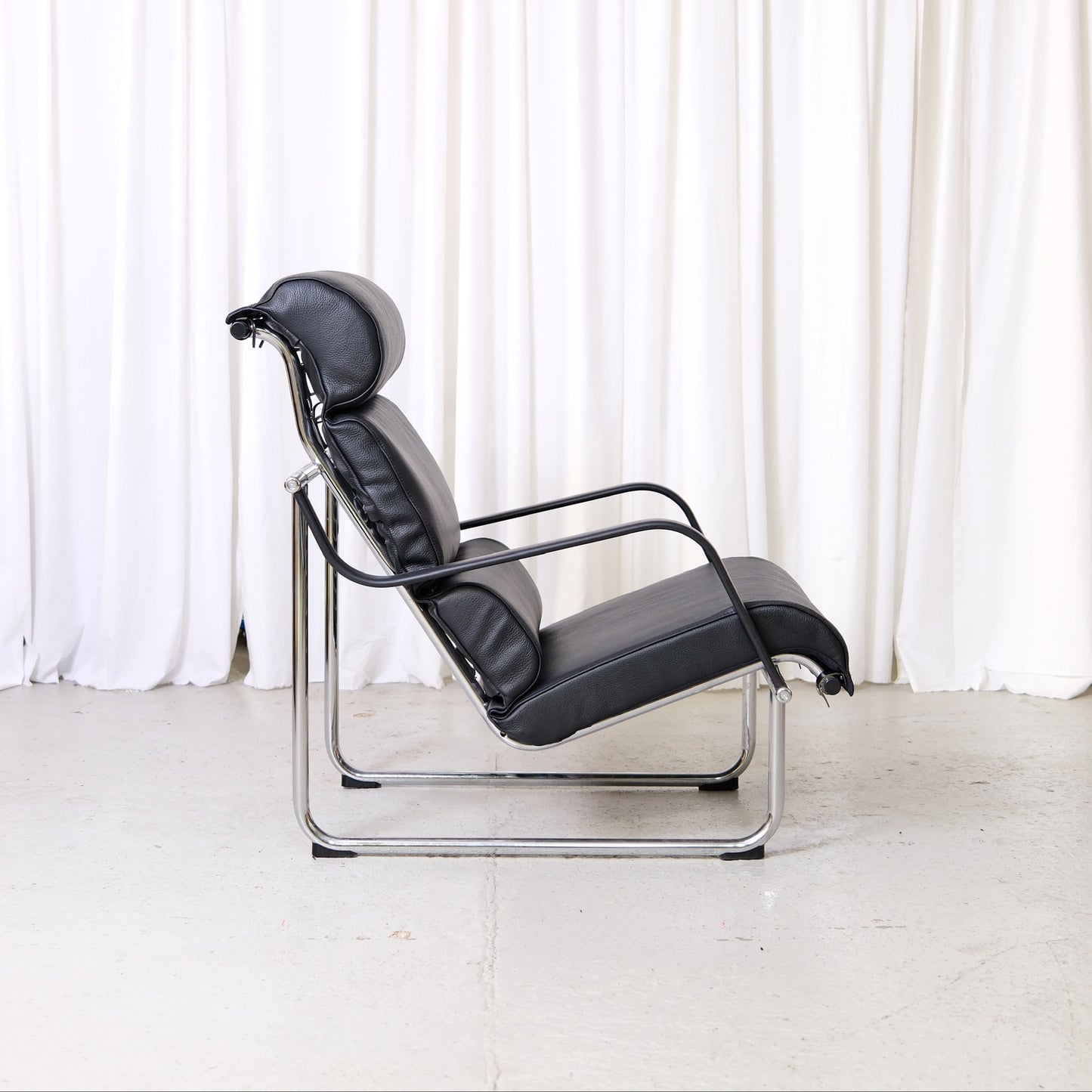 Yrjö Kukkapuro Remmi Lounge Chair and Ottoman in Black Leather