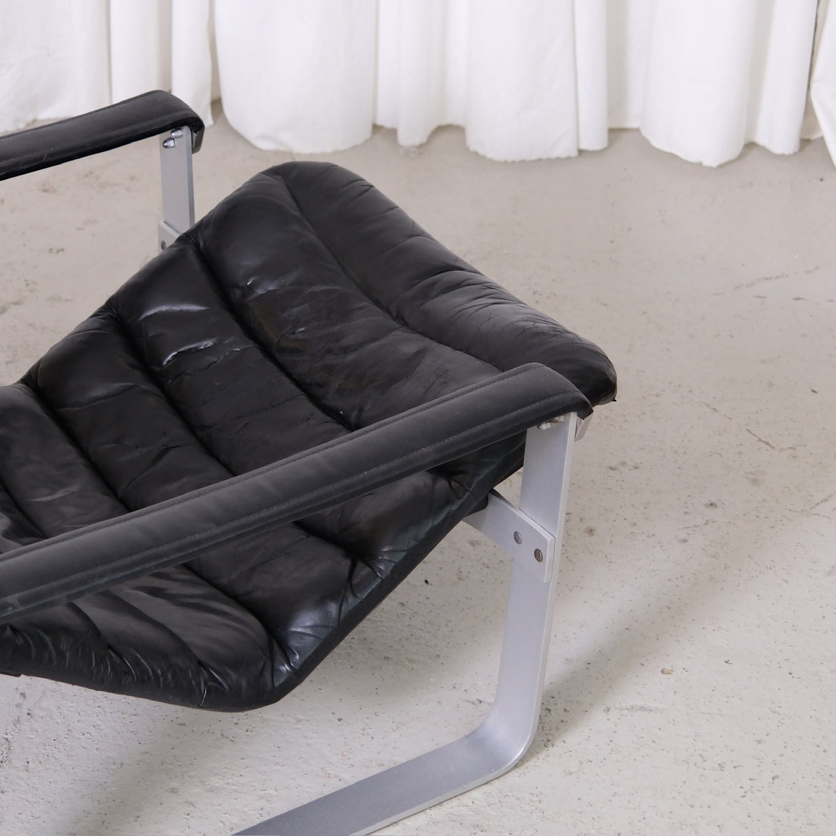 Ilmari Lappalainen Pulkka Lounge Chair and Ottoman in Black Leather, Asko Export
