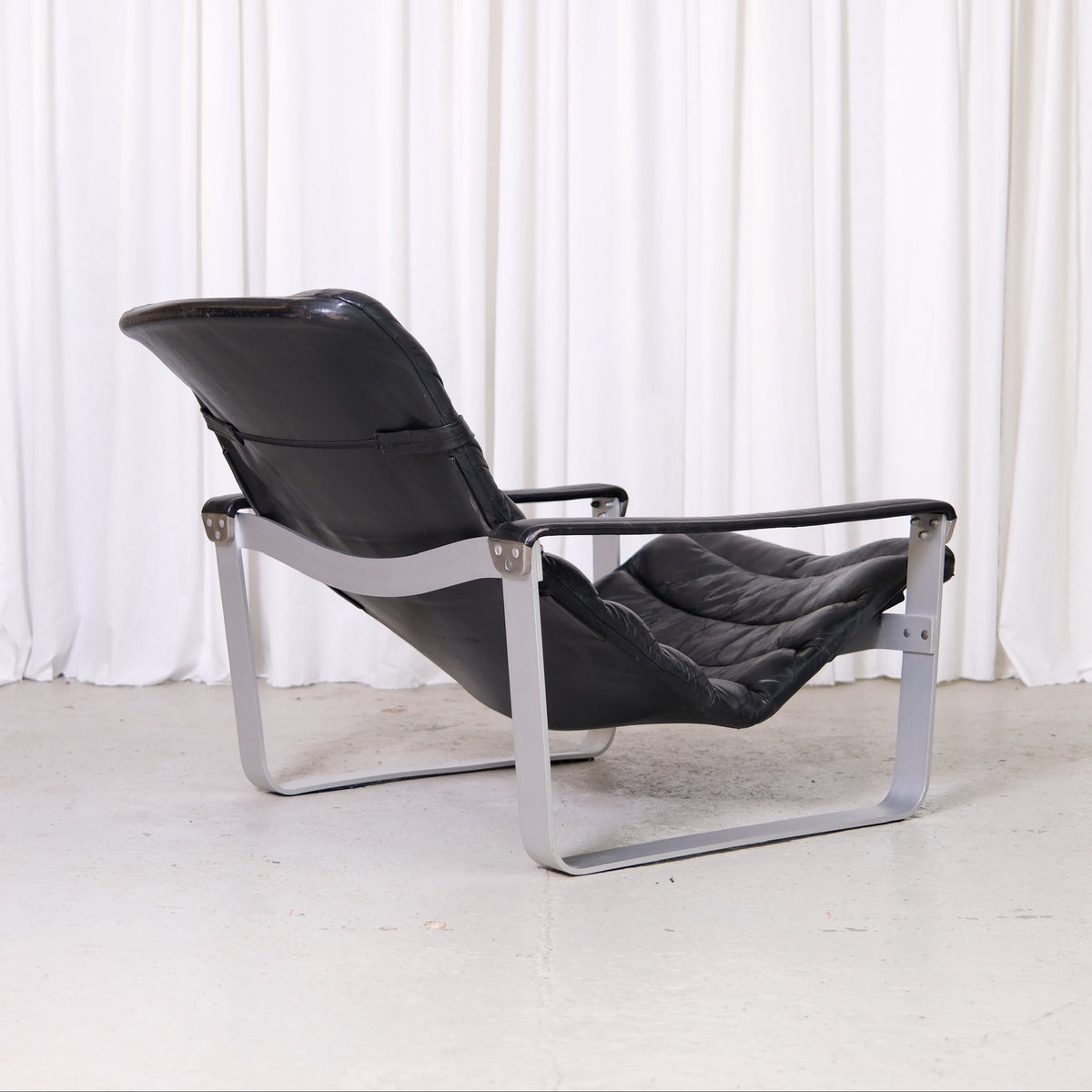 Ilmari Lappalainen Pulkka Lounge Chair and Ottoman in Black Leather, Asko Export