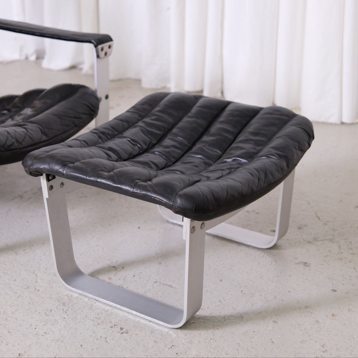 Ilmari Lappalainen Pulkka Lounge Chair and Ottoman in Black Leather, Asko Export