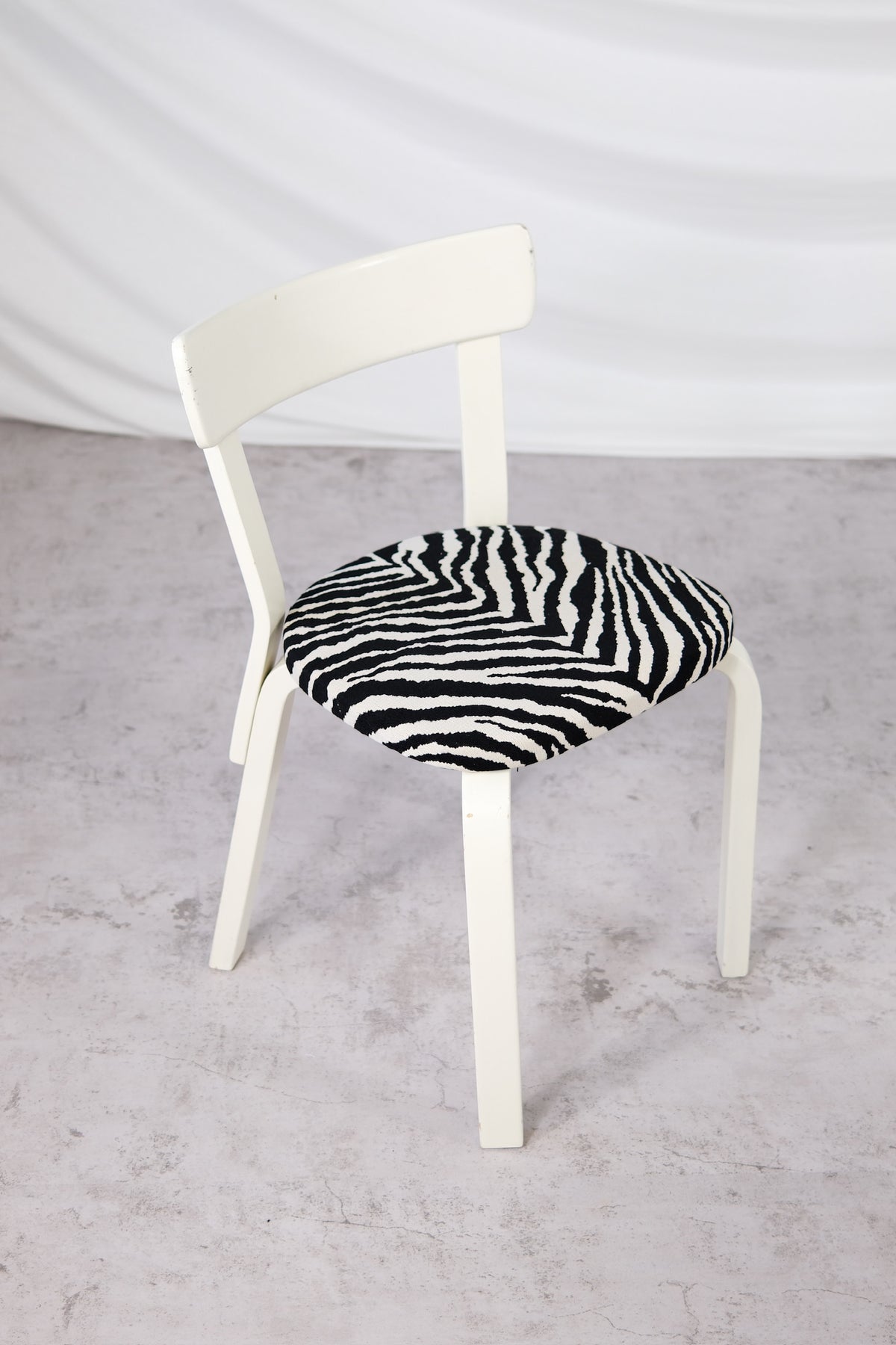 Artek 69 Chairs White Frame with Zebra Upholstery