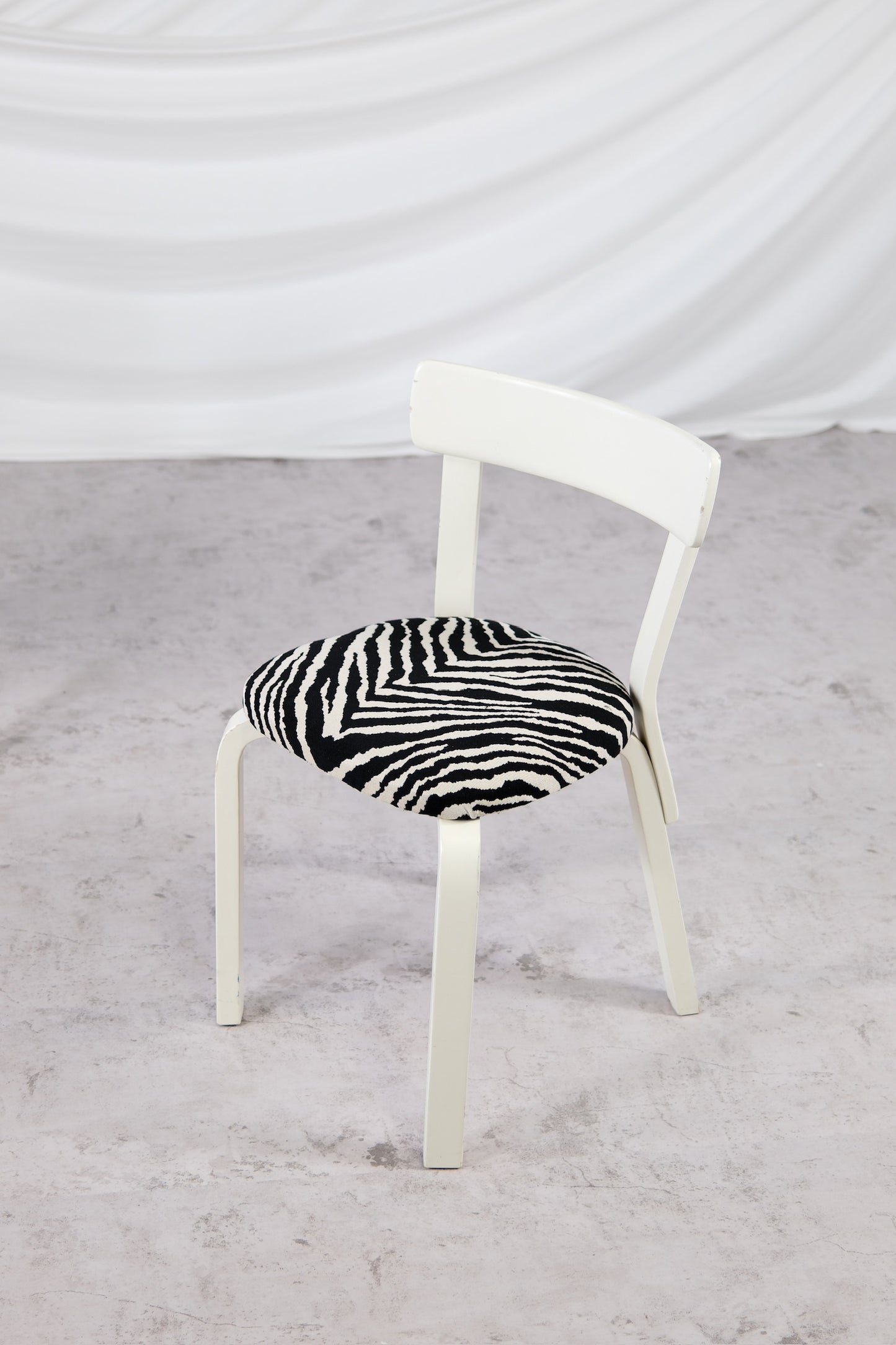 Artek 69 Chairs White Frame with Zebra Upholstery