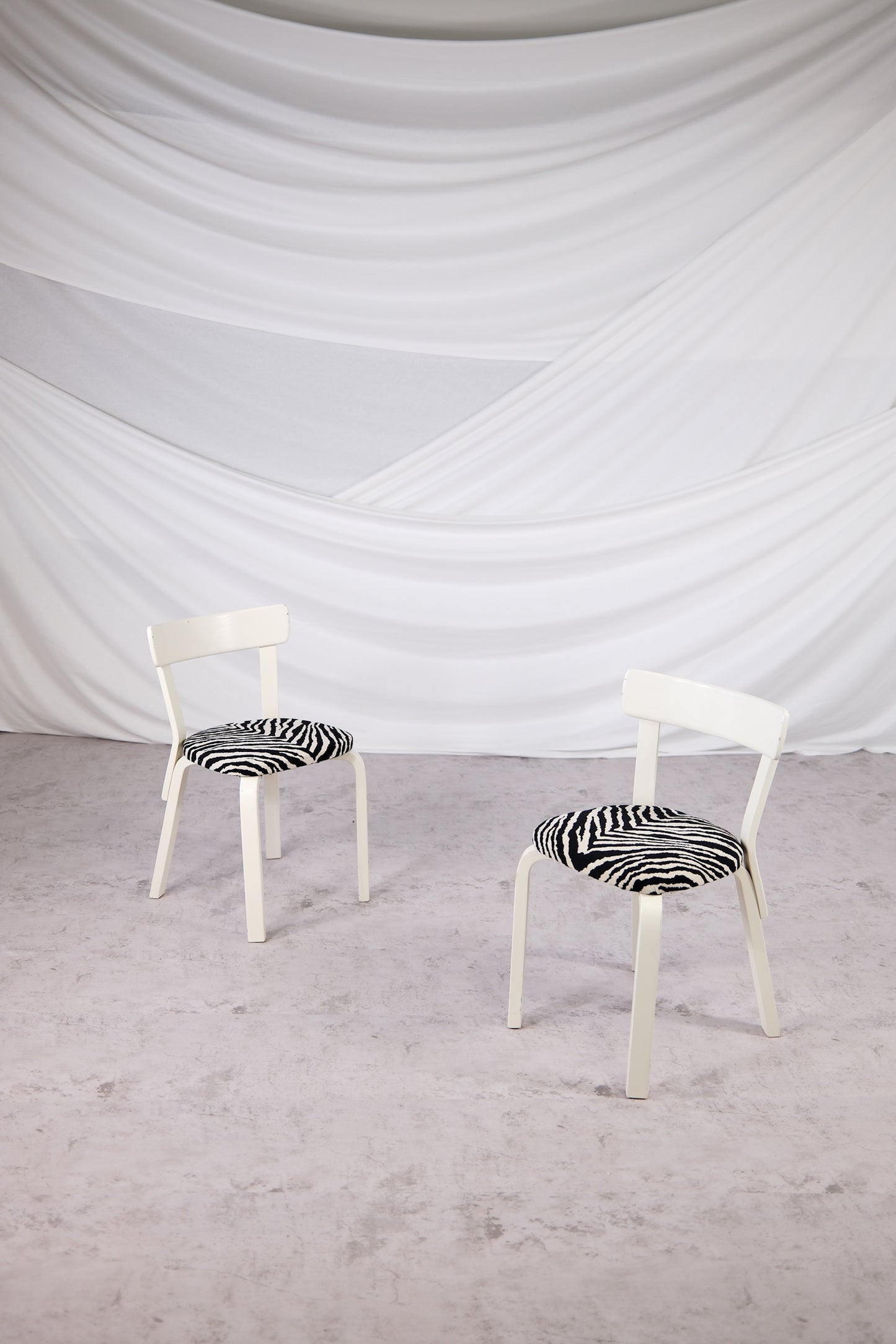 Artek 69 Chairs White Frame with Zebra Upholstery