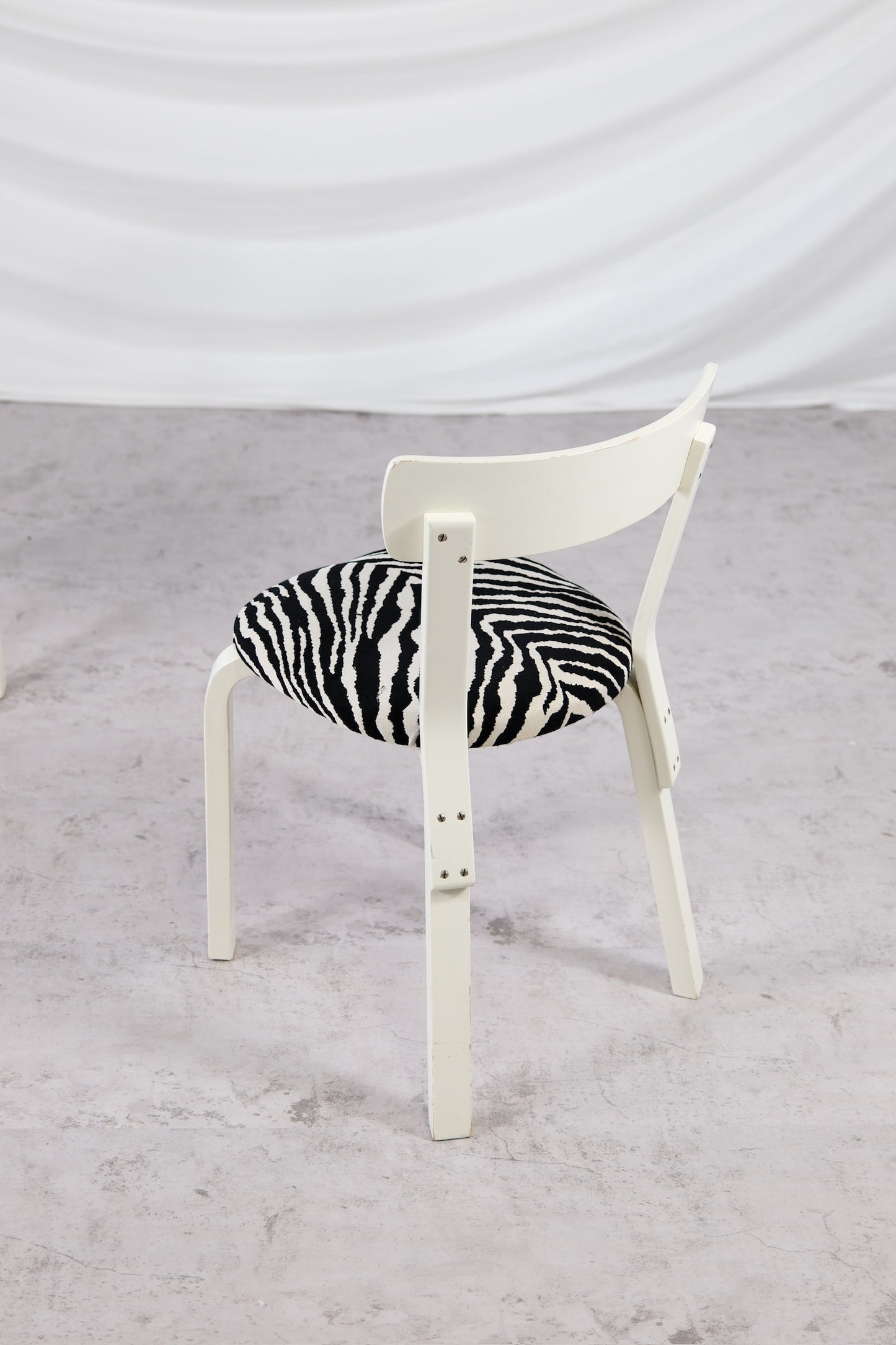 Artek 69 Chairs White Frame with Zebra Upholstery