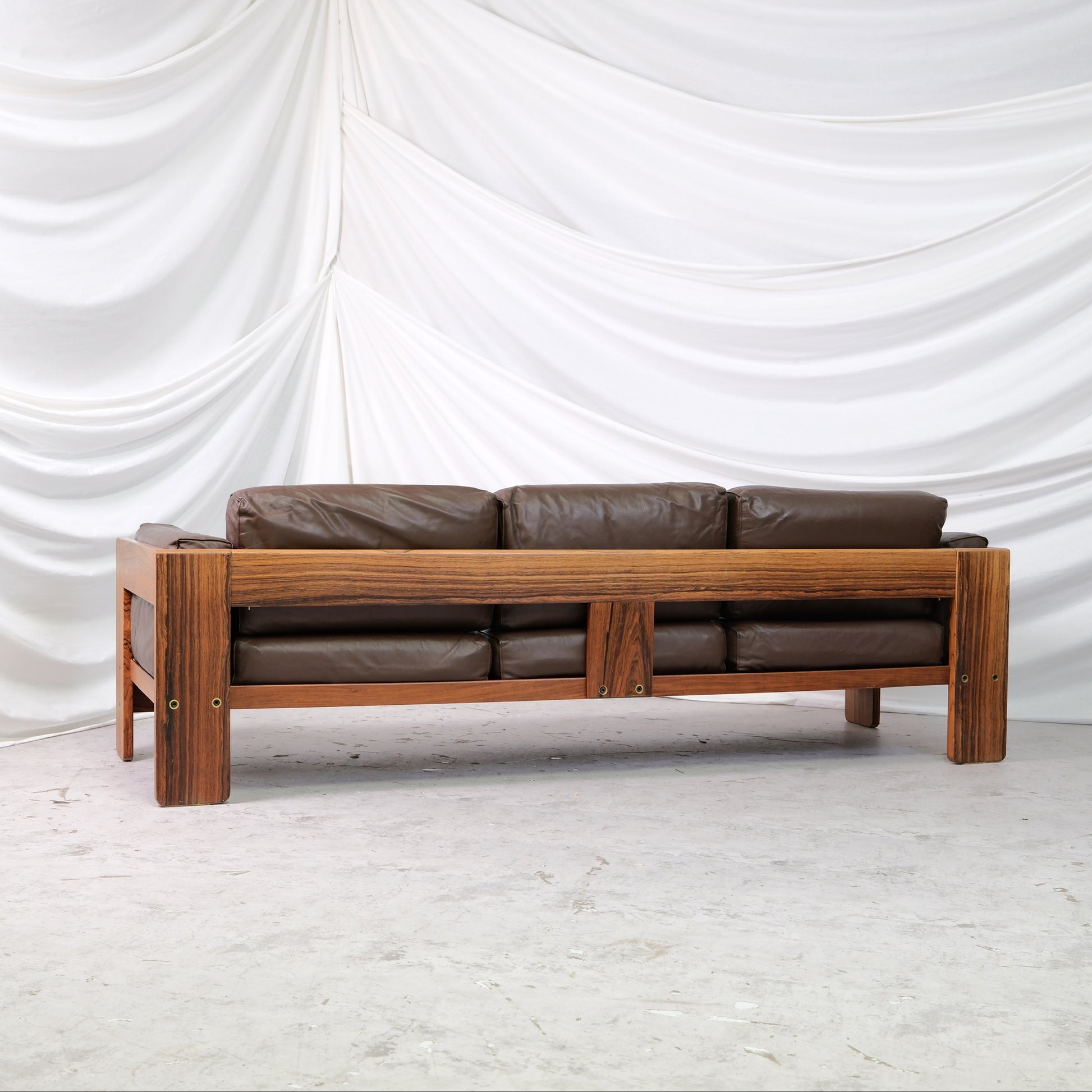Vintage Tobia Scarpa Bastiano 3-seater sofa with dark brown leather cushions and wooden frame