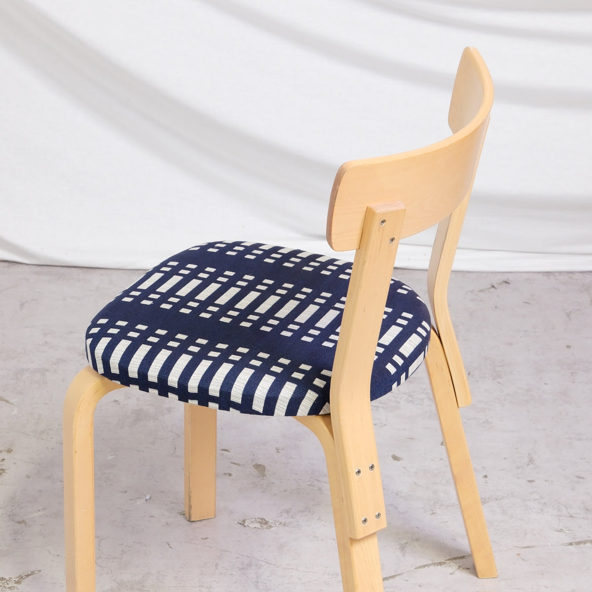 Reupholstered vintage chair by Pino Interiors