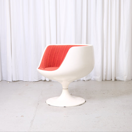 Eero Aarnio Cognac chair with red fabric interior and tulip pedestal base