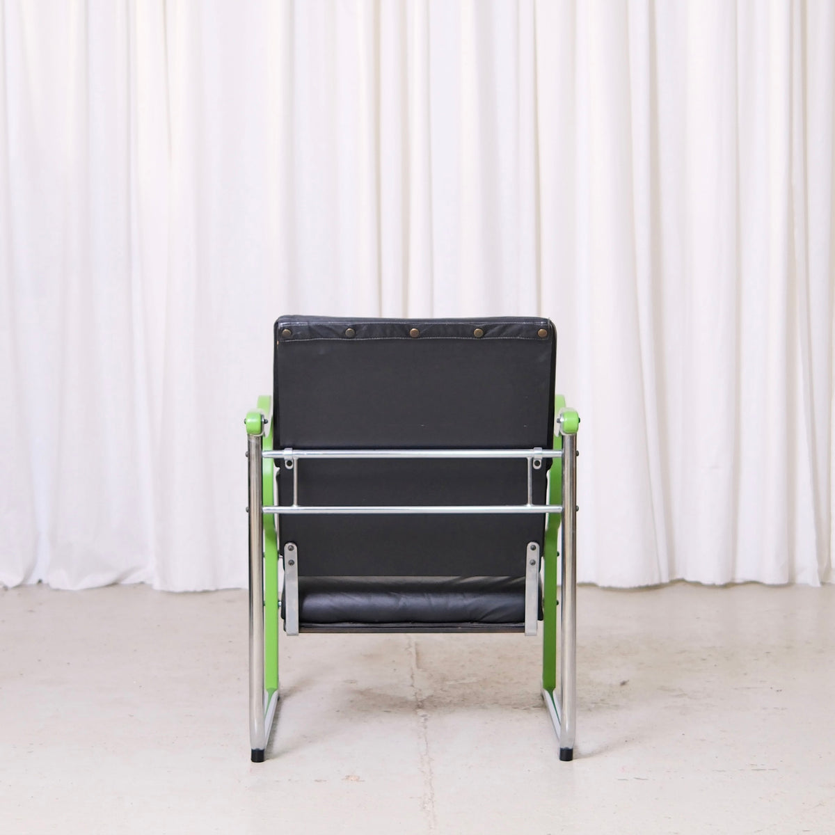 Yrjö Kukkapuro Experiment Lounge Chair in Black Leather and Green Armrests