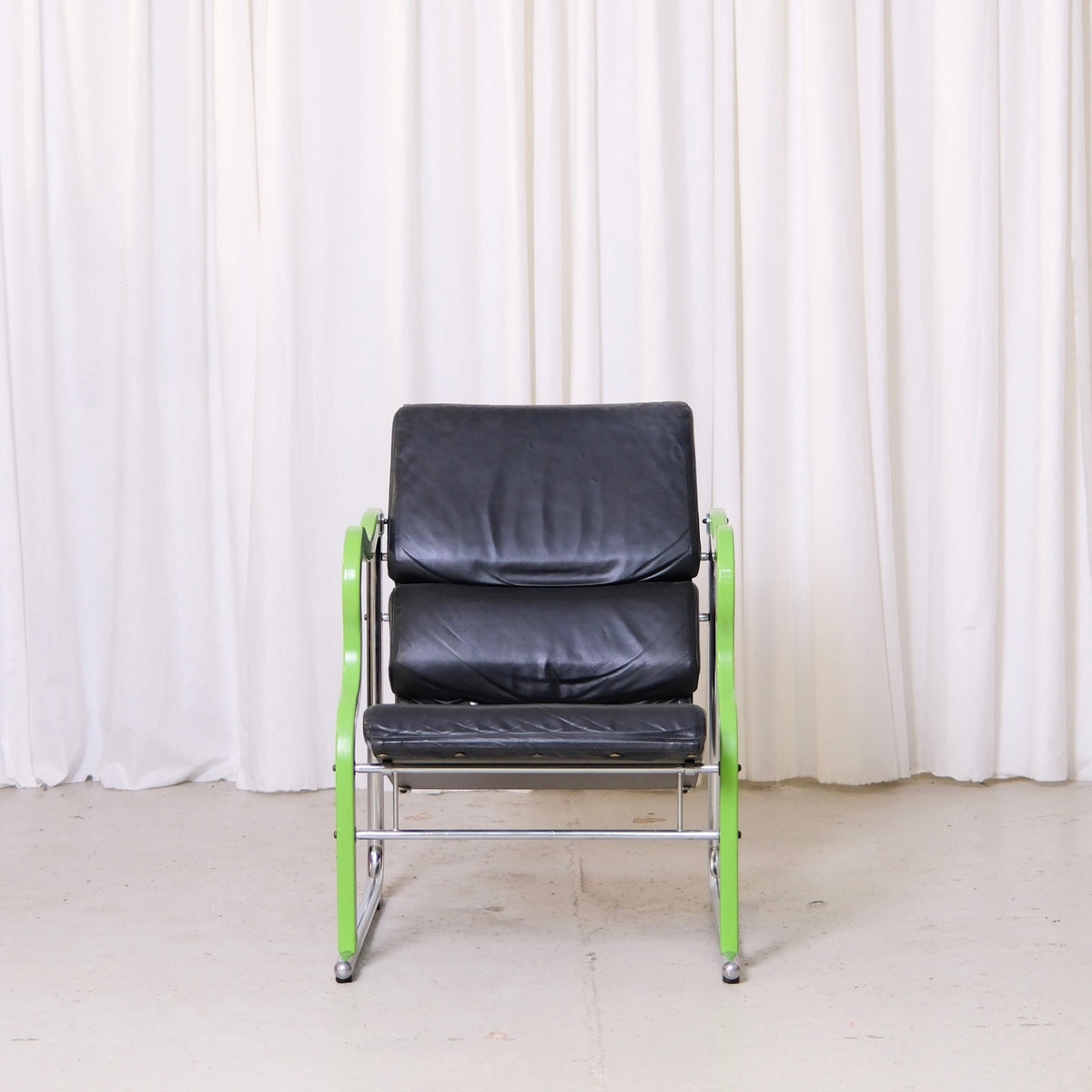 Yrjö Kukkapuro Experiment Lounge Chair in Black Leather and Green Armrests