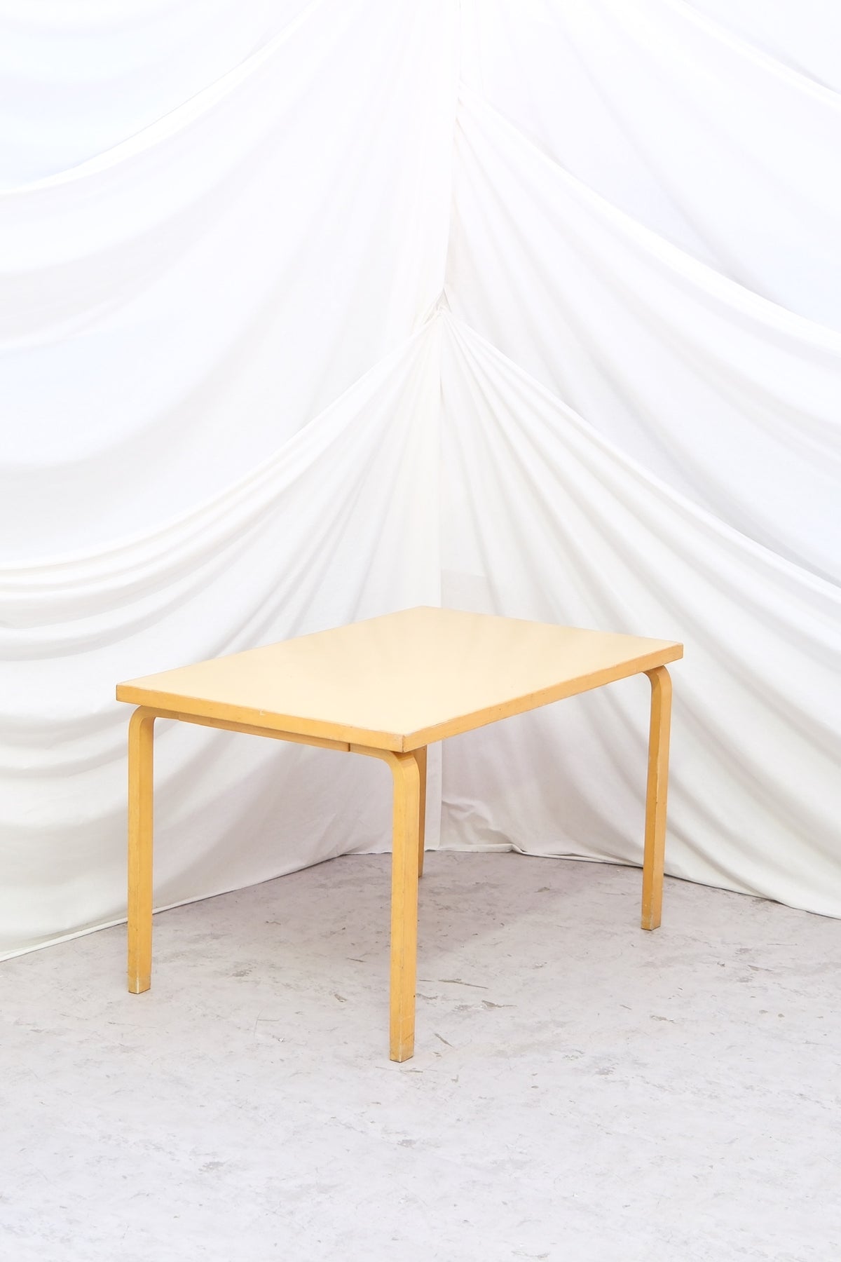 Artek 81B table, light yellow laminate