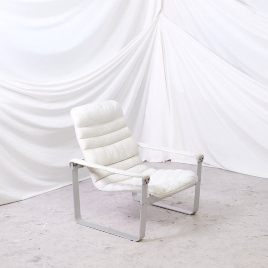 Rare Ilmari Lappalainen Pulkka prototype chair for Asko in white leather with metal frame. Vintage Finnish design with original Asko label.

