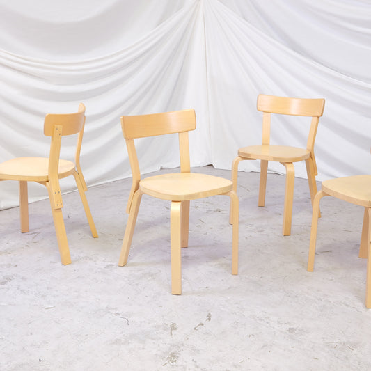 Set of vintage Artek 69 birch dining chairs by Alvar Aalto