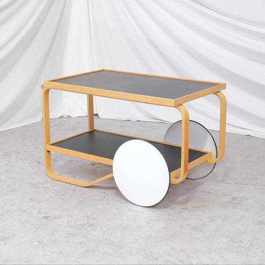 Vintage Alvar Aalto 901 tea trolley with black linoleum shelves and birch bentwood frame