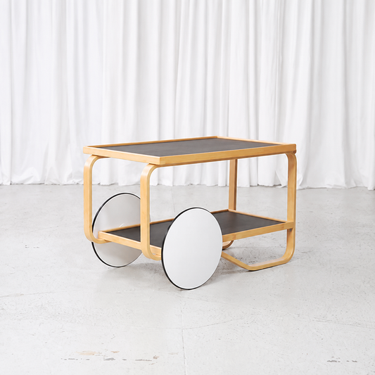 Artek 901 tea trolley in birch with black linoleum shelves