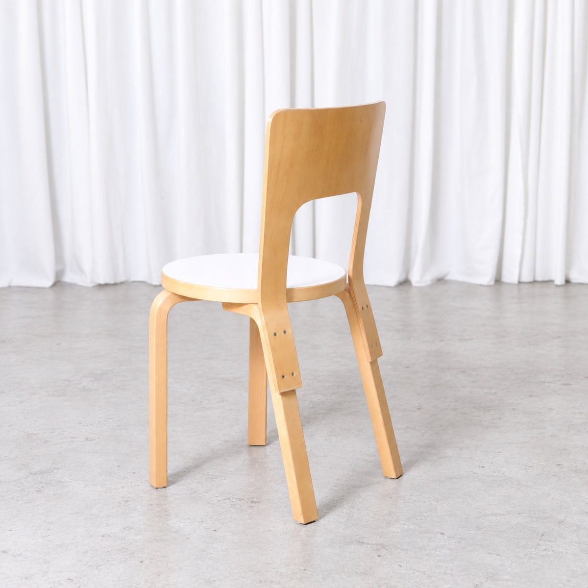 Artek Chair 66 in birch with white laminate seat, rear view