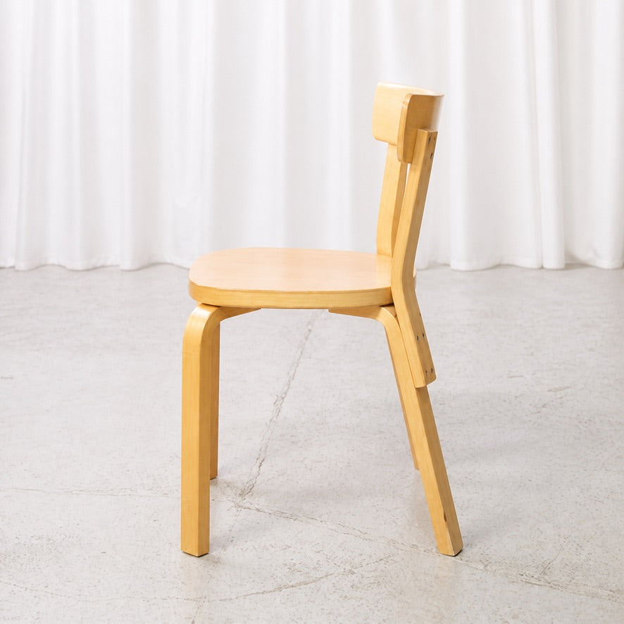 Side view of Artek Chair 69 in birch