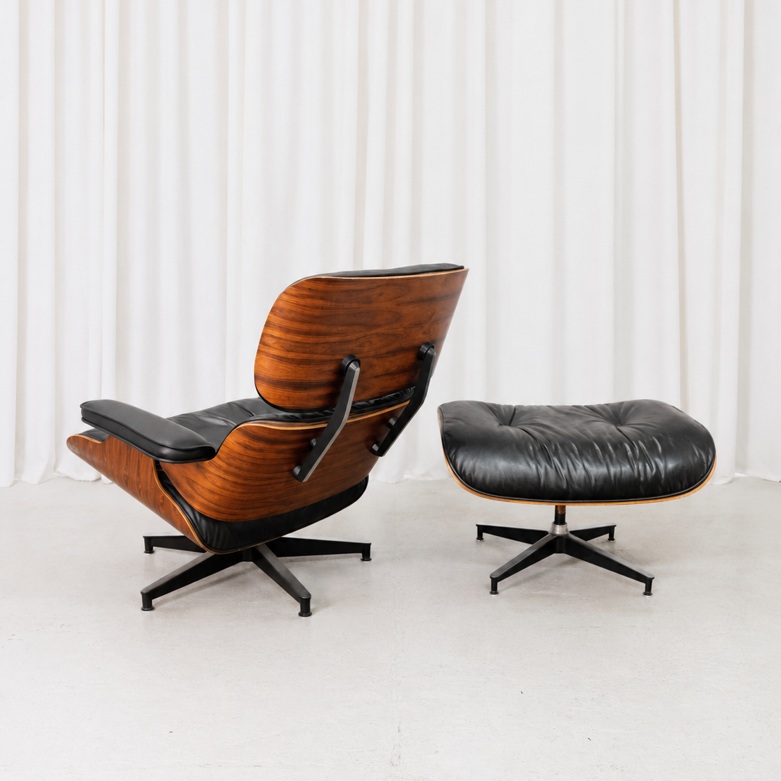 Eames Lounge Chair and Ottoman by Herman Miller in Rosewood and Black Leather