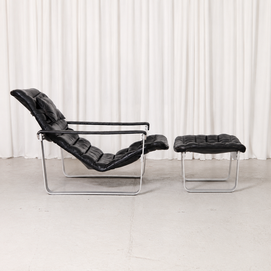 Ilmari Lappalainen Pulkka Lounge Chair and Ottoman in Black Leather, Asko Export