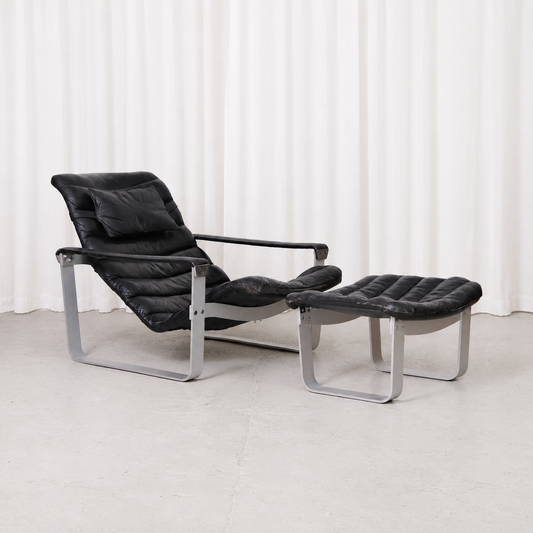 Ilmari Lappalainen Pulkka Lounge Chair and Ottoman in Black Leather, Asko Export