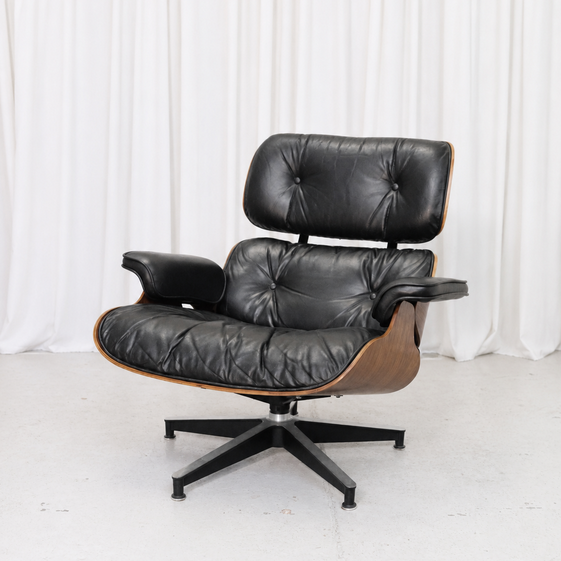 Eames Lounge Chair and Ottoman by Herman Miller in Rosewood and Black Leather