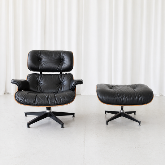 Eames Lounge Chair and Ottoman by Herman Miller in Rosewood and Black Leather