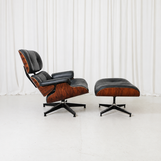Eames Lounge Chair and Ottoman by Herman Miller in Rosewood and Black Leather