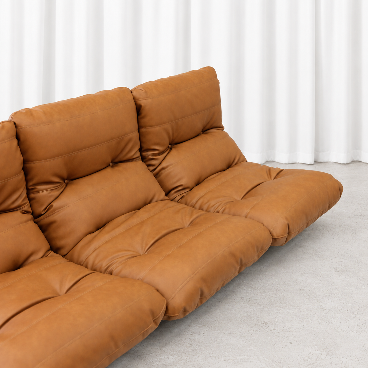 Ligne Roset Marsala sofa newly upholstered cognac leather seats, detail view.