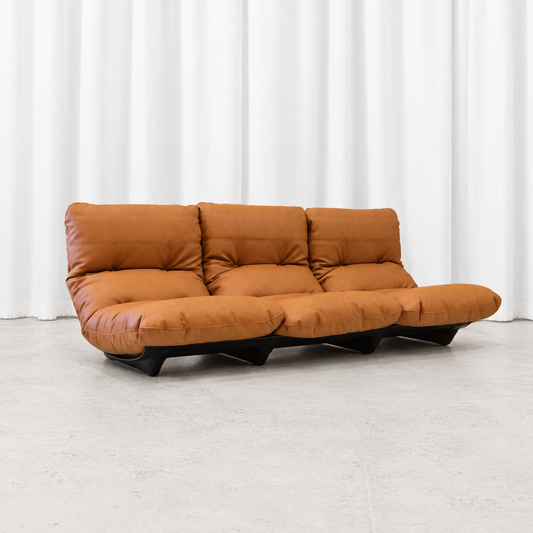 Ligne Roset Marsala three-seater sofa in cognac leather, front angle view.