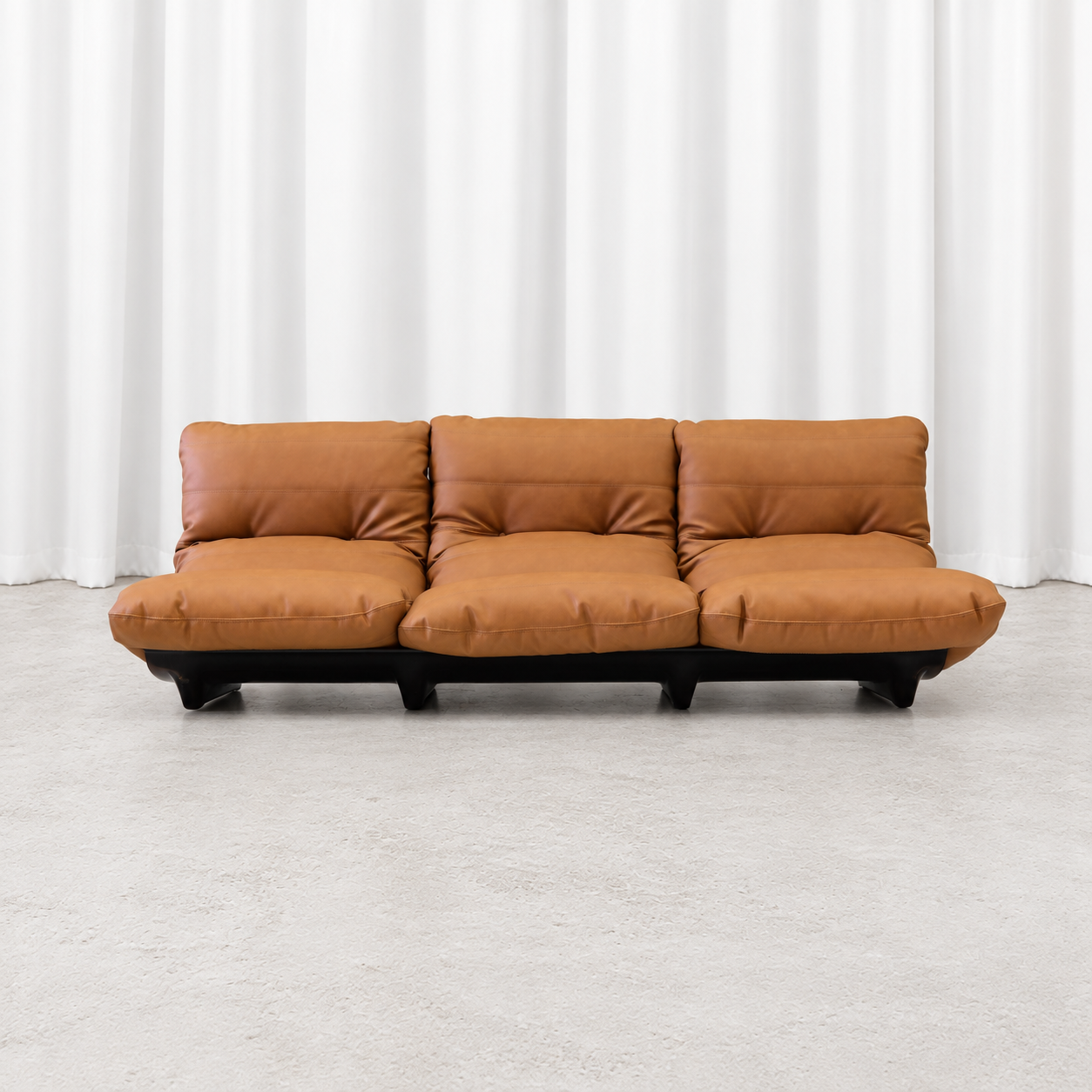 Ligne Roset Marsala three-seater sofa in cognac leather, front view.