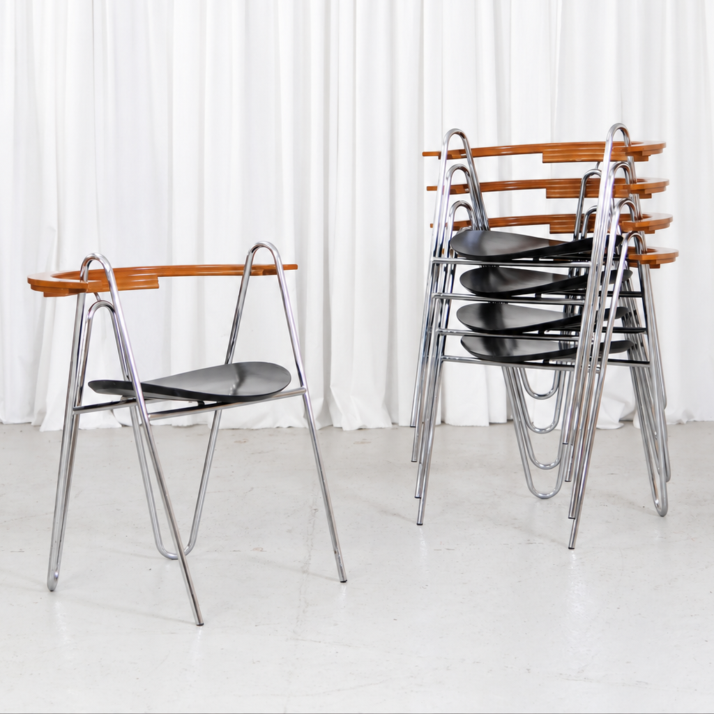 Five Pentti Hakala W chairs in chrome, black and wood, shown stacked and individually