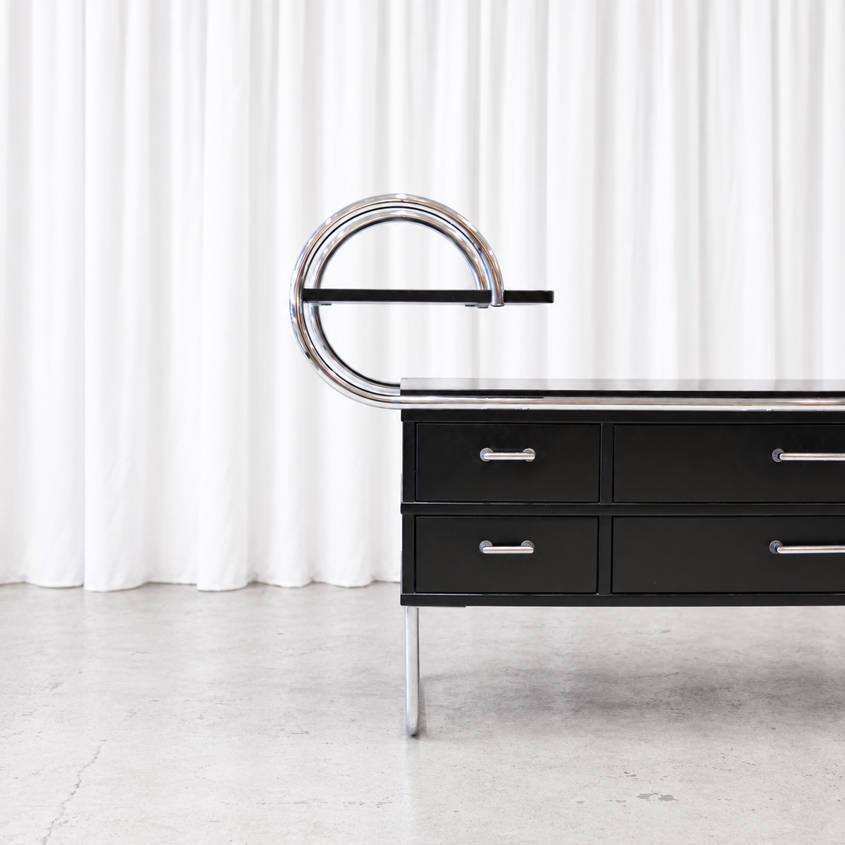 Post Deco 1300 credenza with curved chrome frame and drawers