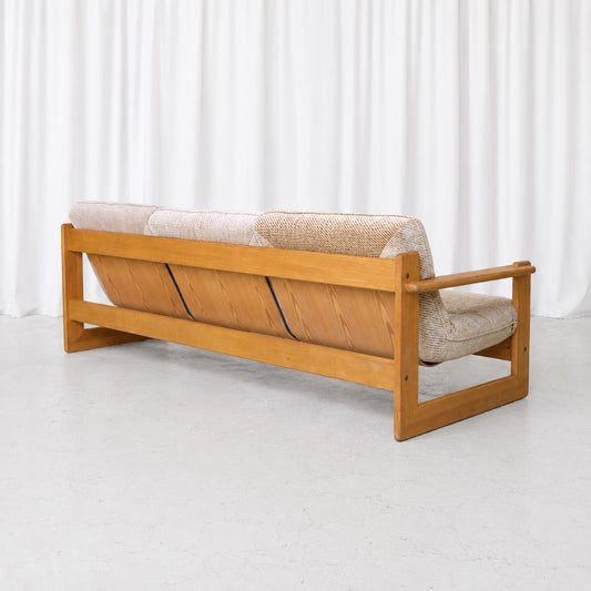 Vilka Seita sofa in lacquered pine, rear three-quarter view