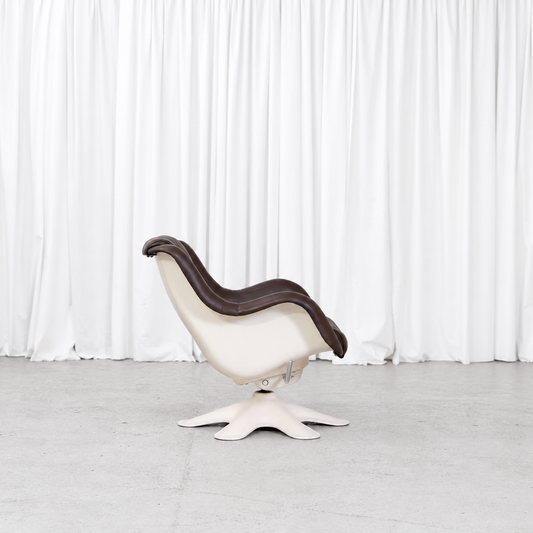 Yrjö Kukkapuro 418 Little Carousel lounge chair in brown leather, side view