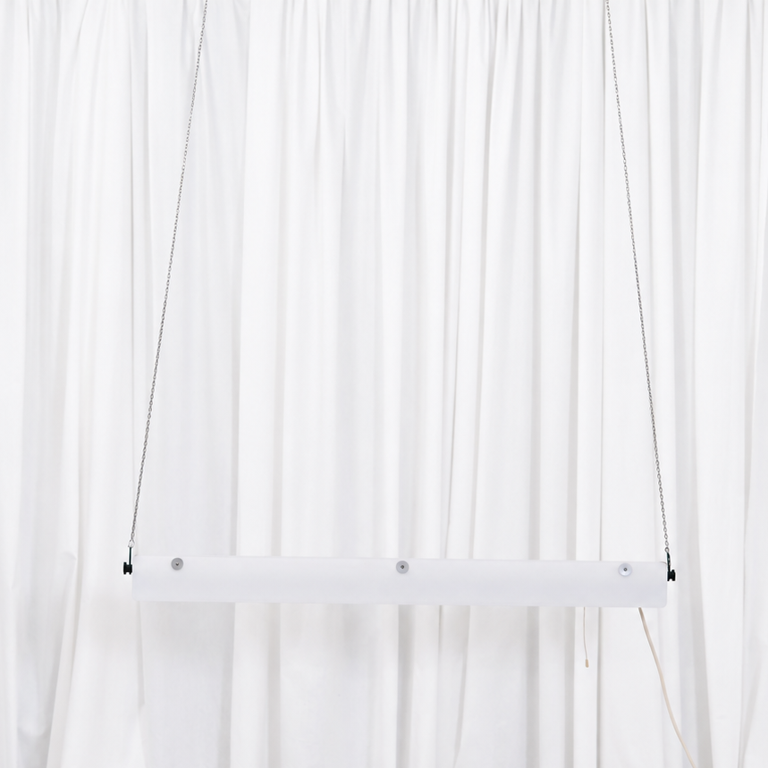 Full view of the white SLO-Metal Oy pendant light suspended from metal chains